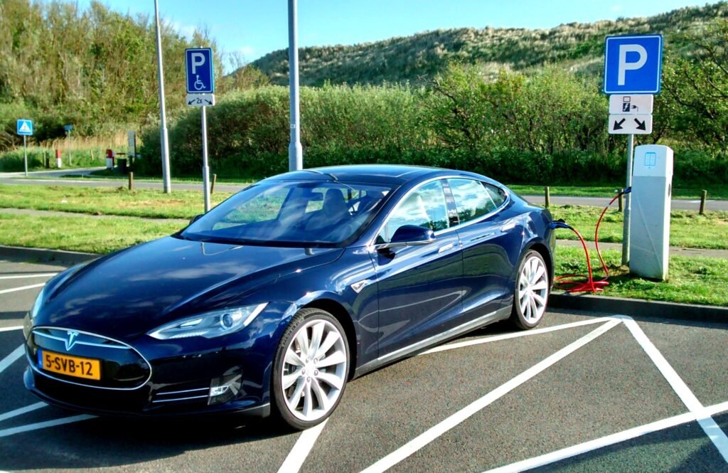 Blue Tesla Model S Zoutelande dunes Holland 1